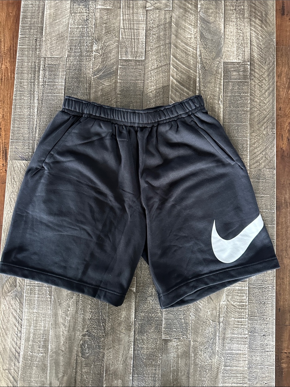 Nike Men’s Black Athletic Shorts with White Swoosh Logo